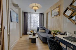 Posezení v ubytování EMPIRE PLATINUM SUITES,New Delhi