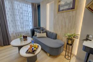 Posezení v ubytování EMPIRE PLATINUM SUITES,New Delhi