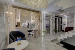 Posezení v ubytování EMPIRE PLATINUM SUITES,New Delhi