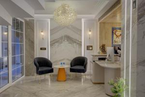 Posezení v ubytování EMPIRE PLATINUM SUITES,New Delhi