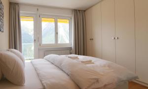 Giường trong phòng chung tại Viktoria B16 by Arosa Holiday +20 ảnh
