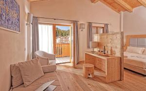 Postel nebo postele na pokoji v ubytování Hotel Chalet Del Brenta