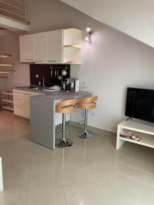 Kuchyňa alebo kuchynka v ubytovaní Villa Jani Top Floor Suite