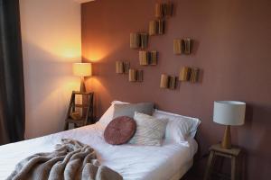 Postel nebo postele na pokoji v ubytování Lavandières