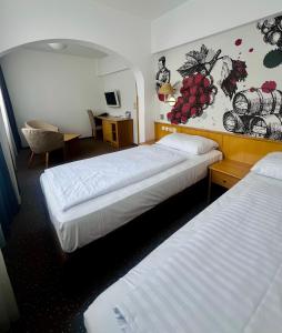Ein Bett oder Betten in einem Zimmer der Unterkunft Hotel Piramida