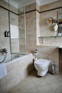 Ein Badezimmer in der Unterkunft Hotel Piramida