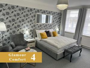 Postel nebo postele na pokoji v ubytování EFIPA Glamour Apartments