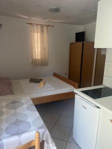 Kuchyň nebo kuchyňský kout v ubytování Apartments Svekrić