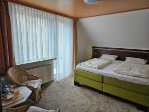 Postel nebo postele na pokoji v ubytování Seehotel Andree & Gästehaus Seehof