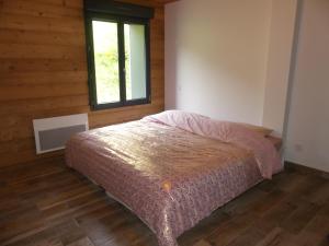 LE MASSIF - Appartements tout confort avec vue客房内的一张或多张床位