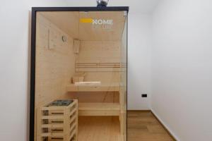a room with a sauna with a glass wall at Gorska Idila - Kuća za odmor Jela in Stari Laz +7 photos