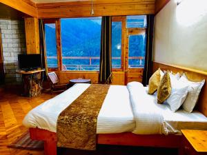 Postelja oz. postelje v sobi nastanitve The Vashisht, Manali - A Four Star Luxury Hotel