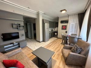 TV a/nebo společenská místnost v ubytování The U HOMES APART
