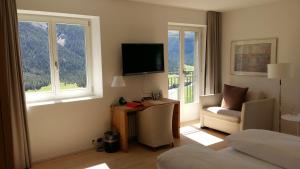 TV o dispositivi per l'intrattenimento presso Hotel Castell