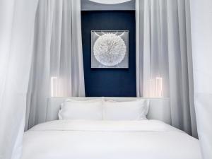 AM Manye Hotel 객실 침대