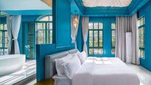Postel nebo postele na pokoji v ubytování A hotel