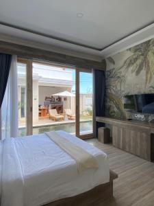 Fotografie z fotogalerie ubytování Evara Villas by Aayan v destinaci Tanah Lot