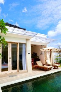 Fotografie z fotogalerie ubytování Evara Villas by Aayan v destinaci Tanah Lot