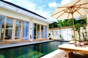 Fotografie z fotogalerie ubytování Evara Villas by Aayan v destinaci Tanah Lot