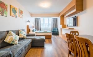 Posezení v ubytování New Gudauri NG Rooms + 14 fotografií
