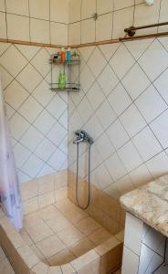 Ένα μπάνιο στο Fterini Apartments Sterna & Alletri +81 φωτογραφίες