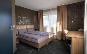 Ένα ή περισσότερα κρεβάτια σε δωμάτιο στο Bed and Breakfast 33