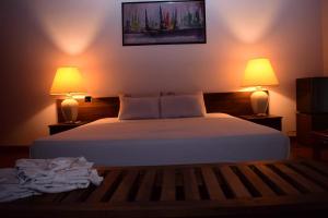 En eller flere senge i et værelse på Black Forest Beach Resort + 73 billeder