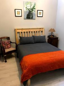 Ένα ή περισσότερα κρεβάτια σε δωμάτιο στο Protea Self-Catering Accommodation