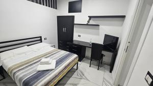 Postel nebo postele na pokoji v ubytování Rooms Vico Giunti