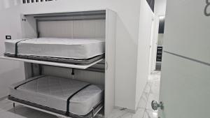 Postel nebo postele na pokoji v ubytování Rooms Vico Giunti