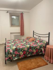 Postel nebo postele na pokoji v ubytování appartamento da Ernesto