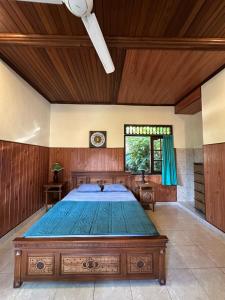 Postel nebo postele na pokoji v ubytování Kajeng Bungalow