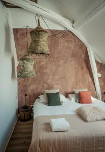 Postel nebo postele na pokoji v ubytování Le Charron de Sancerre