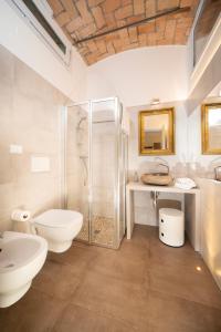 a bathroom with a shower and a toilet and a sink at La Ca dal Non Bioagriturismo - Alpenice in Savignano sul Panaro +55 photos