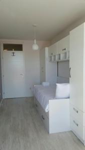 Postel nebo postele na pokoji v ubytování Single Room- Aparthotel GEA