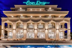 a large building with a pool in front of it at Casa Deniso - The Home of Chill in Byala