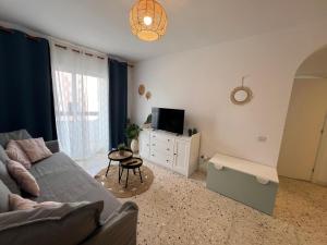 TV a/nebo společenská místnost v ubytování Moonlight Apartment