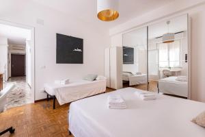 เตียงในห้องที่ nel cuore di Parma CENTRALISSIMO