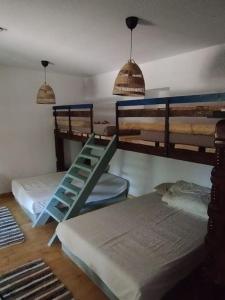 Ένα ή περισσότερα κρεβάτια σε δωμάτιο στο Verebesi Sit and Dream Cottage