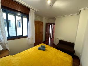 Postel nebo postele na pokoji v ubytování Apartamento Salgueirón