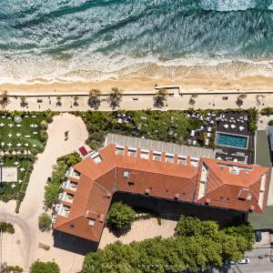 an overhead view of a house next to the beach at Grand Hotel Des Sablettes Plage, Curio Collection By Hilton in La Seyne-sur-Mer