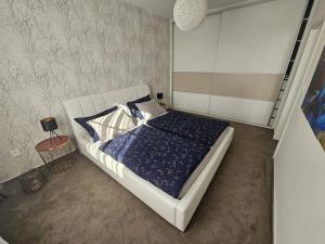 Postelja oz. postelje v sobi nastanitve Apartmán Rataj
