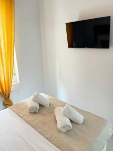 Μια τηλεόραση ή/και κέντρο ψυχαγωγίας στο Carolinas Suites by Coqueto