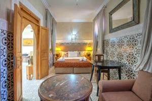 Letto o letti in una camera di Riad Inaka