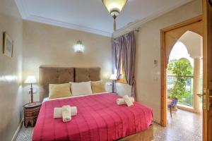 Letto o letti in una camera di Riad Inaka