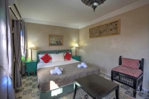 Letto o letti in una camera di Riad Inaka
