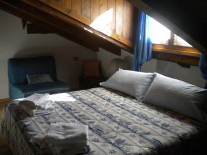 Letto o letti in una camera di Bed and Breakfast Cappeler