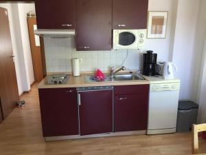 Η κουζίνα ή μικρή κουζίνα στο Haus Strandläufer Wohnung 3