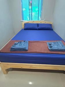 Postel nebo postele na pokoji v ubytování Noot's Guesthouse