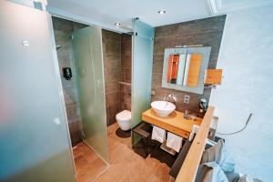Koupelna v ubytování Hotel Eden Wellness